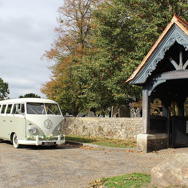 VW camper outside church for wedding