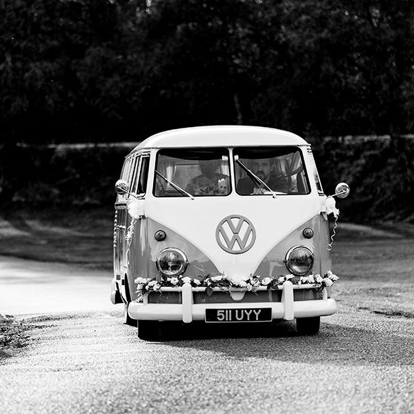 Vintage Splitscreen VW Camper arriving at wedding