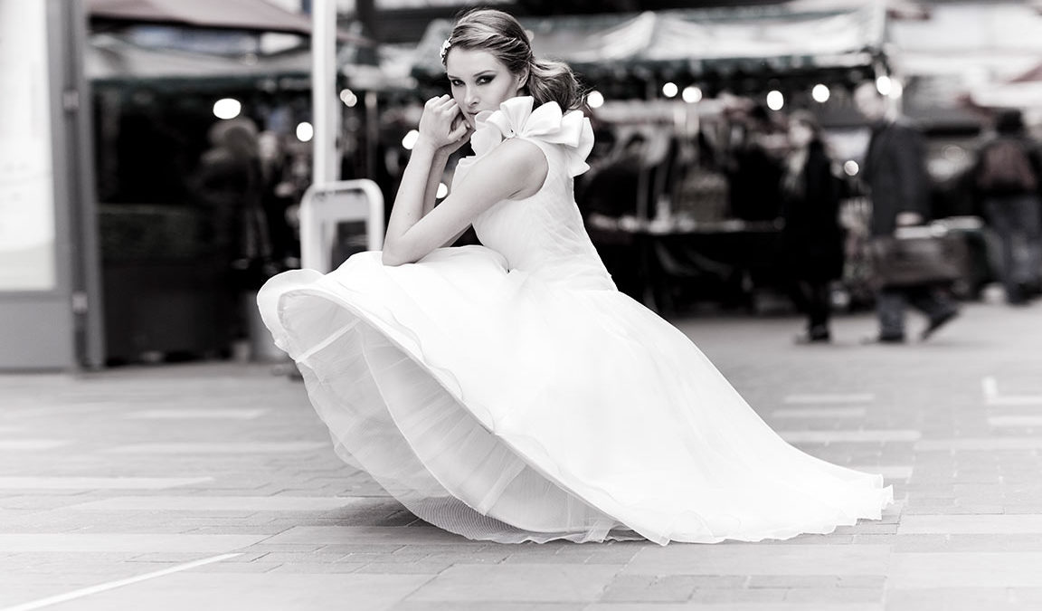 ea-length, asymmetric, satin and organza bridal gown